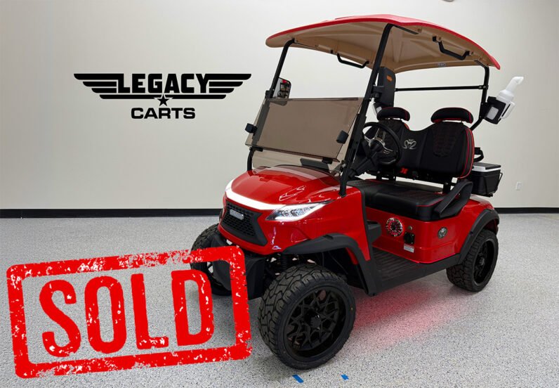 Venom EV Strike 2-passenger golf cart in bold red, featuring upgraded seats, underglow lights, Apple CarPlay, and street-legal certification.